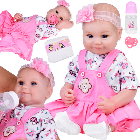 Baby doll in pink romper with frill + accessories ZA5359