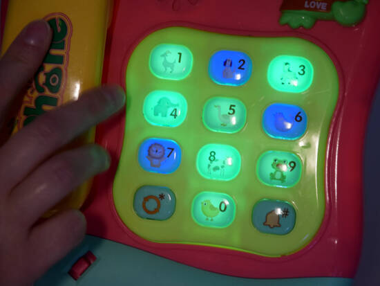 Colorful button phone plays melodies and lights ZA4625