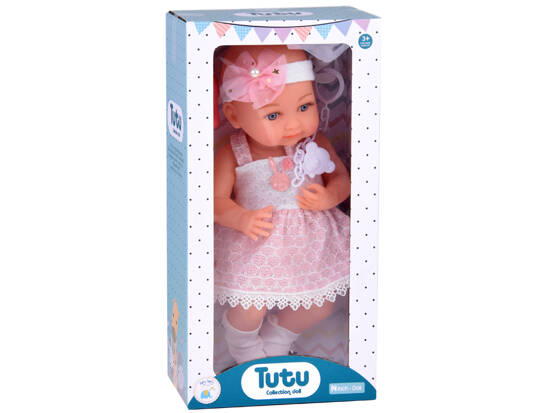 Rubber baby doll in a pink dress, bottle, pacifier ZA5235