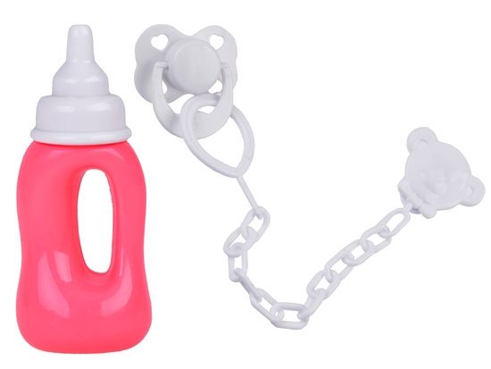 Rubber baby doll in a pink dress, bottle, pacifier ZA5235