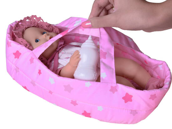 The doll in the carrier, the doll drinks and pees ZA5155