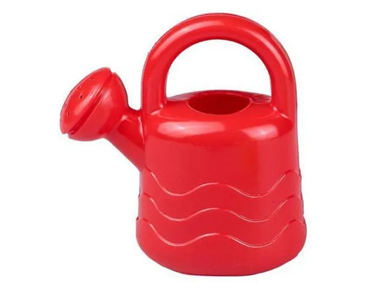 A colorful plastic watering can for a small gardener's child ZA5398