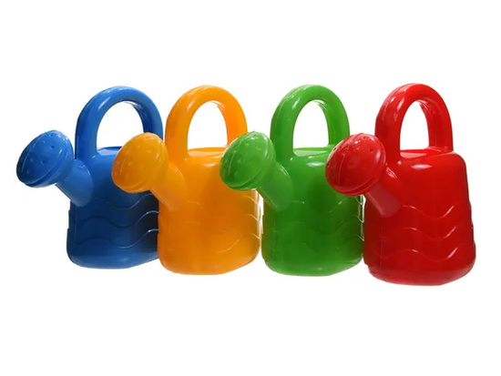 A colorful plastic watering can for a small gardener's child ZA5398