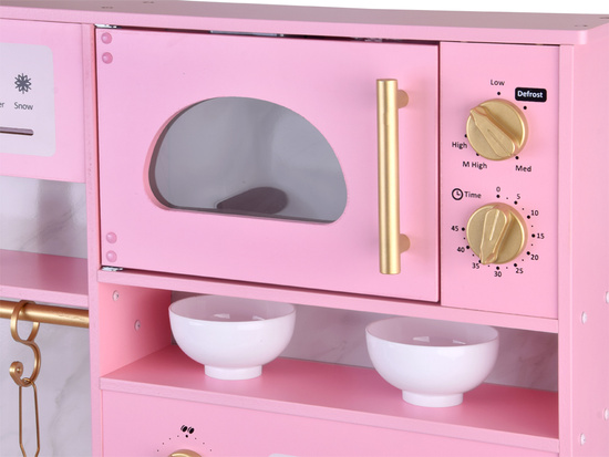 Large interactive wooden kitchen with glamour gold accessories and ZA5933 coffee machine